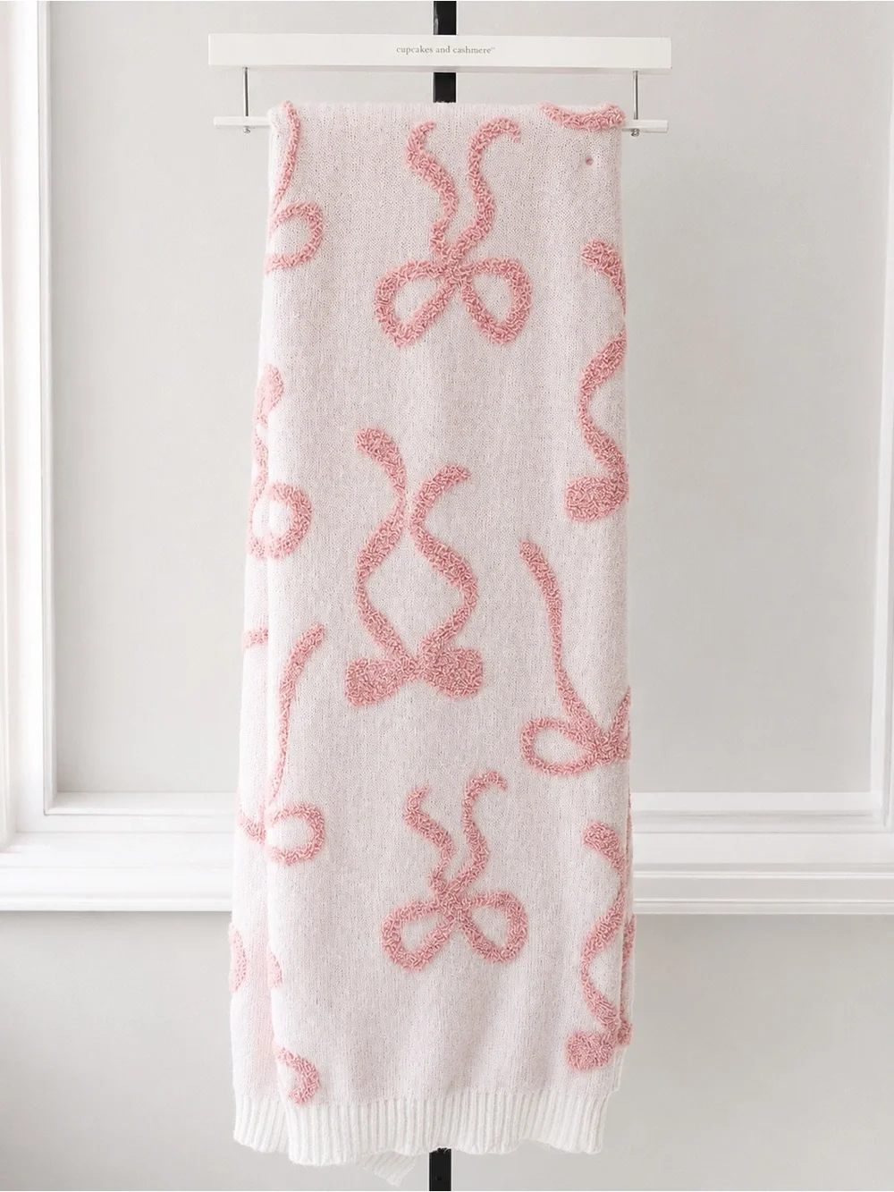 cupcakes & cashmere Pink Bow Motif Decorative Throw